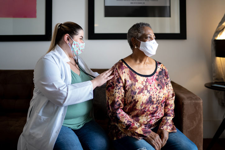 doctor listening with stethoscope